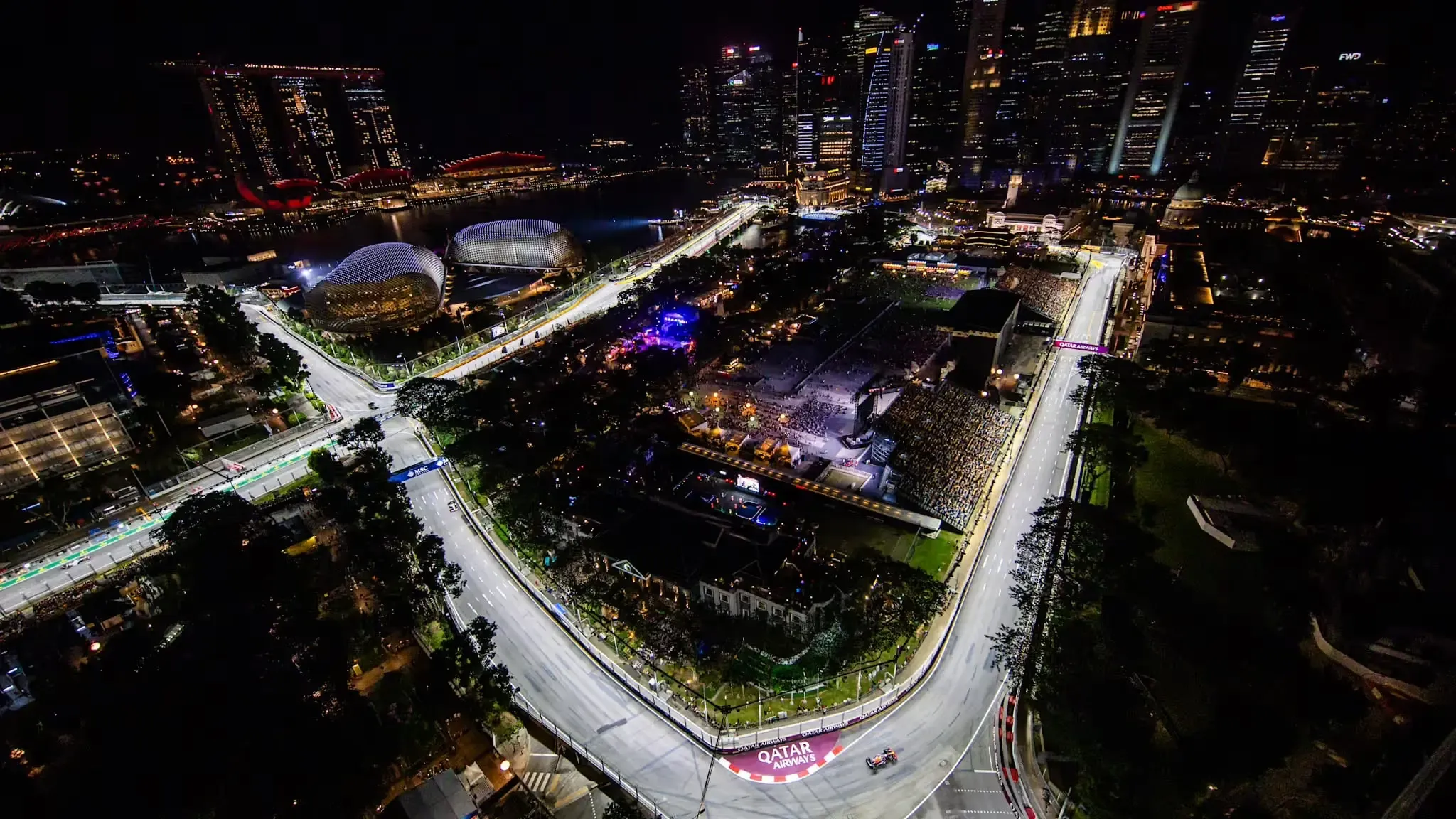 Wide shot of the Singapore Grand Prix start under lights